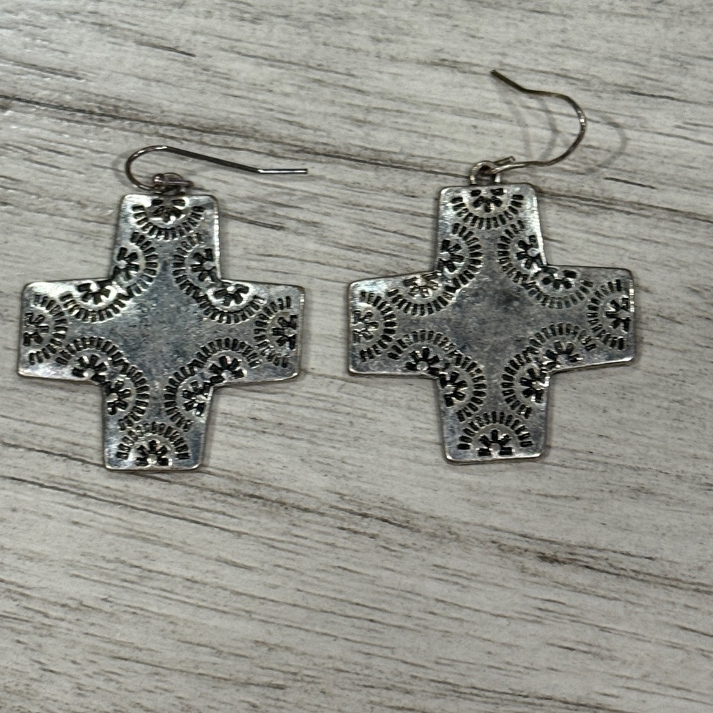 Vintage cross earrings Navajo ,pressed design w/a crystal on back of 1 earring